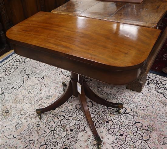 A Regency style banded mahogany folding card table W.92cm